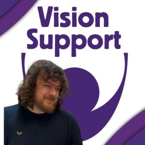 The Vision Support logo in bold purple. In front of the logo to the left corner, is a picture of a Rob with curly hair and a beard, wearing a dark sweater with a small gold emblem. The picture is framed with purple curved accents on the top left and bottom right corners.