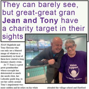 A newspaper-style layout with a large headline in purple stating, “They can barely see, but great-great gran Jean and Tony have a charity target in their sights.” Below the headline is a photo of two smiling older adults standing beside an indoor swimming pool. One person wears a purple Vision Support T-shirt with the charity’s logo. The article text surrounds the photo, discussing their long-distance charity swim and the support they receive for sight loss.